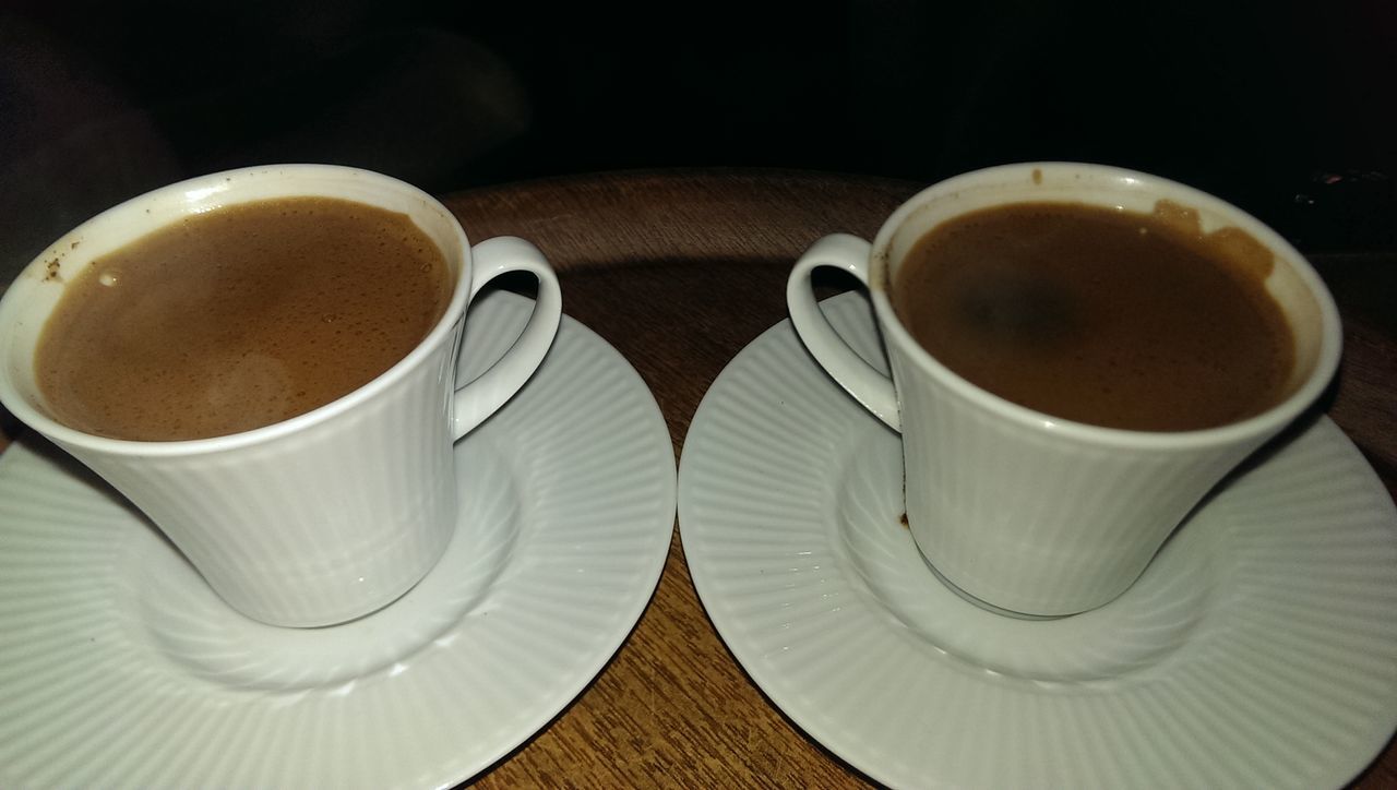 coffee cup, drink, coffee - drink, food and drink, refreshment, saucer, table, coffee, indoors, cup, freshness, still life, frothy drink, cappuccino, tea cup, close-up, high angle view, tea, beverage, froth art