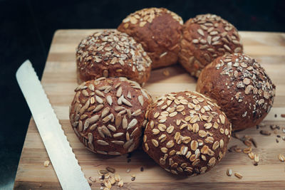 Close-up of bread buns on cutting board