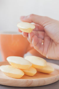 Close-up of hand holding fruit