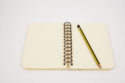 High angle view of pencils on white background