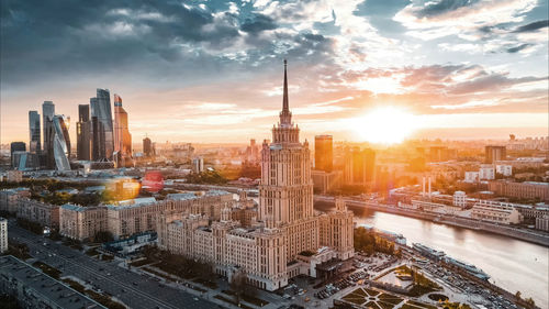 Cityscape against sky during sunset