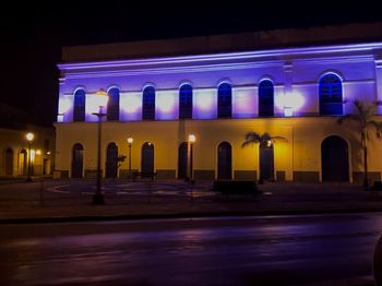 Illuminated building at night