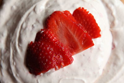 Close-up of ice cream with strawberry