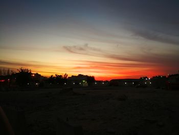 Scenic view of silhouette landscape against sky during sunset