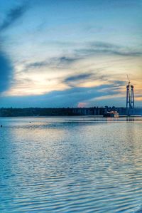 Scenic view of sea against cloudy sky