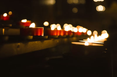 Close-up of illuminated lights at night