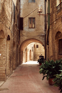 Alley amidst buildings in town