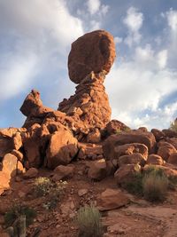 Rock formation on land against sky