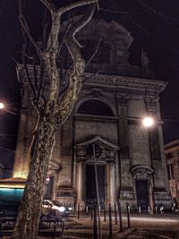 Low angle view of illuminated street light at night