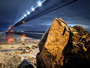 Panoramic view of bridge over sea against sky