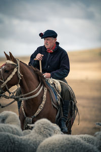 Man riding horse