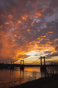Scenic view of a bridge against sky during sunset