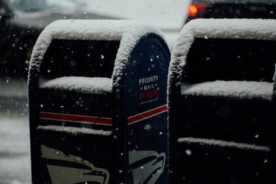 Close-up of public mailbox during winter