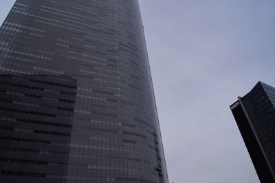 Low angle view of modern building against sky