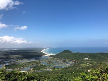 High angle view of beach against blue sky