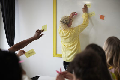 Diverse team brainstorming during business meeting in conference room