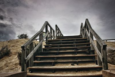 Low angle view of staircase against sky