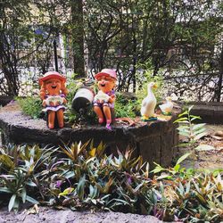 View of statue against trees and plants