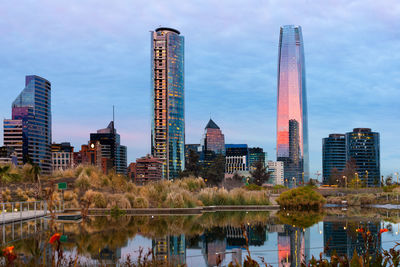 Skyline of financial district in las condes from bicentennial park in vitacura, santiago de chile