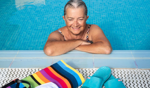 High angle view of woman at swimming pool