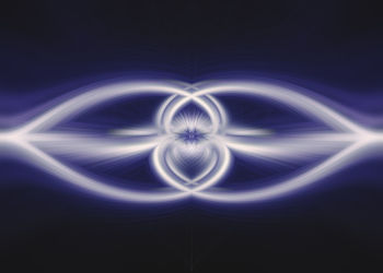 Abstract image of illuminated light painting against black background