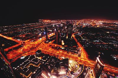 High angle view of cityscape illuminated at night