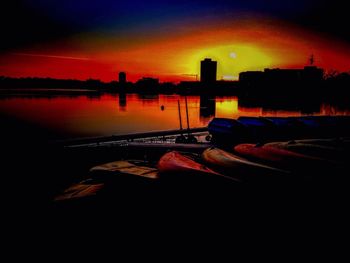 Scenic view of lake at sunset