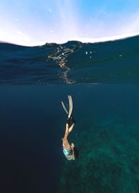 Man swimming in sea