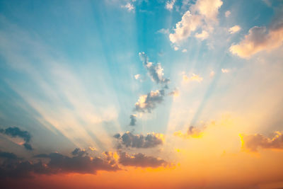 Low angle view of dramatic sky during sunset