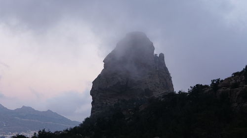 Low angle view of mountain against sky