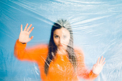 Portrait of a young woman in water