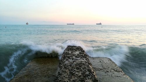 Scenic view of sea against sky during sunset