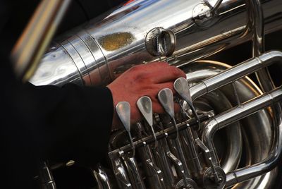 Cropped hand holding trumpet