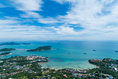 High angle view of bay against cloudy sky