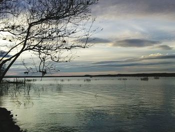 Scenic view of sea against sky at sunset