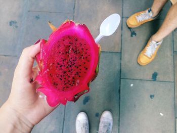 Low section of woman standing on ground