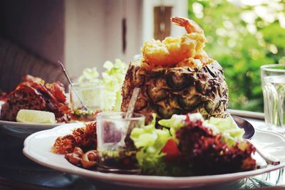 Close-up of served food in plate