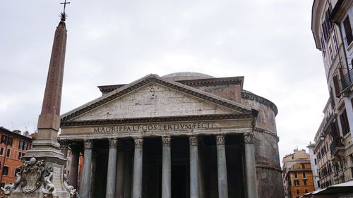 Low angle view of historic building against sky