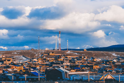 High angle view of buildings against sky in city