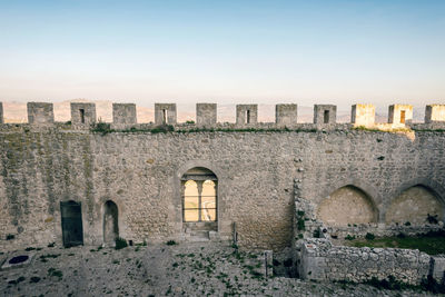 Old ruin castle against clear sky