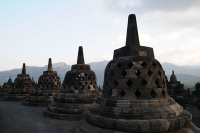 Stupas of building against sky