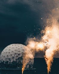 Close-up of firework display at night