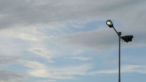 Low angle view of street light against sky