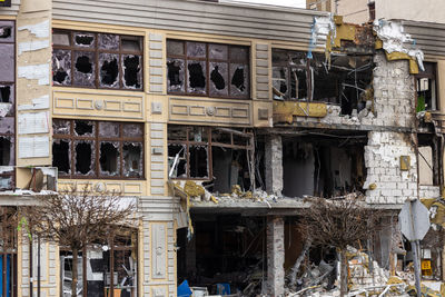 Destroyed buildings on the streets of irpen. broken windows. buildings after being hit by missiles.