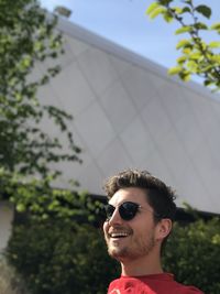 Smiling young man wearing sunglasses