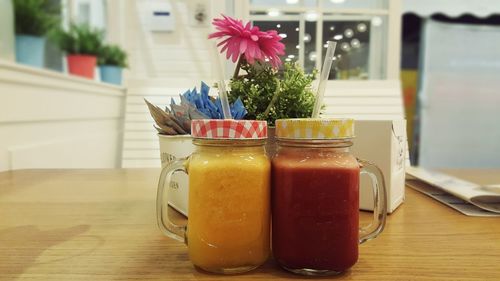 Close-up of flower vase on table