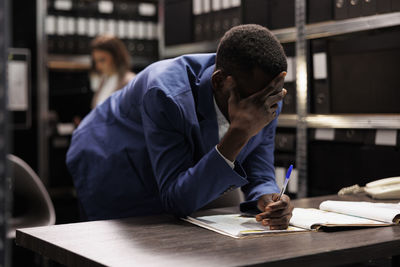 Man working at table