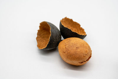 Close-up of cookies against white background
