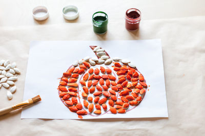 High angle view of cupcakes on cutting board