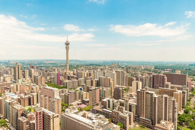 Cityscape with hillbrow tower against sky